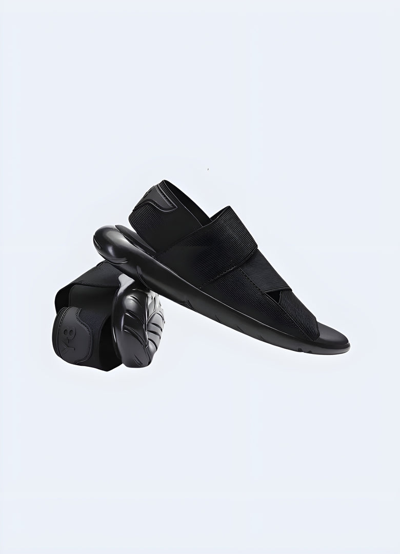 Black ninja sandals, side view, available in Canada, highlighting the contemporary look and versatile design.