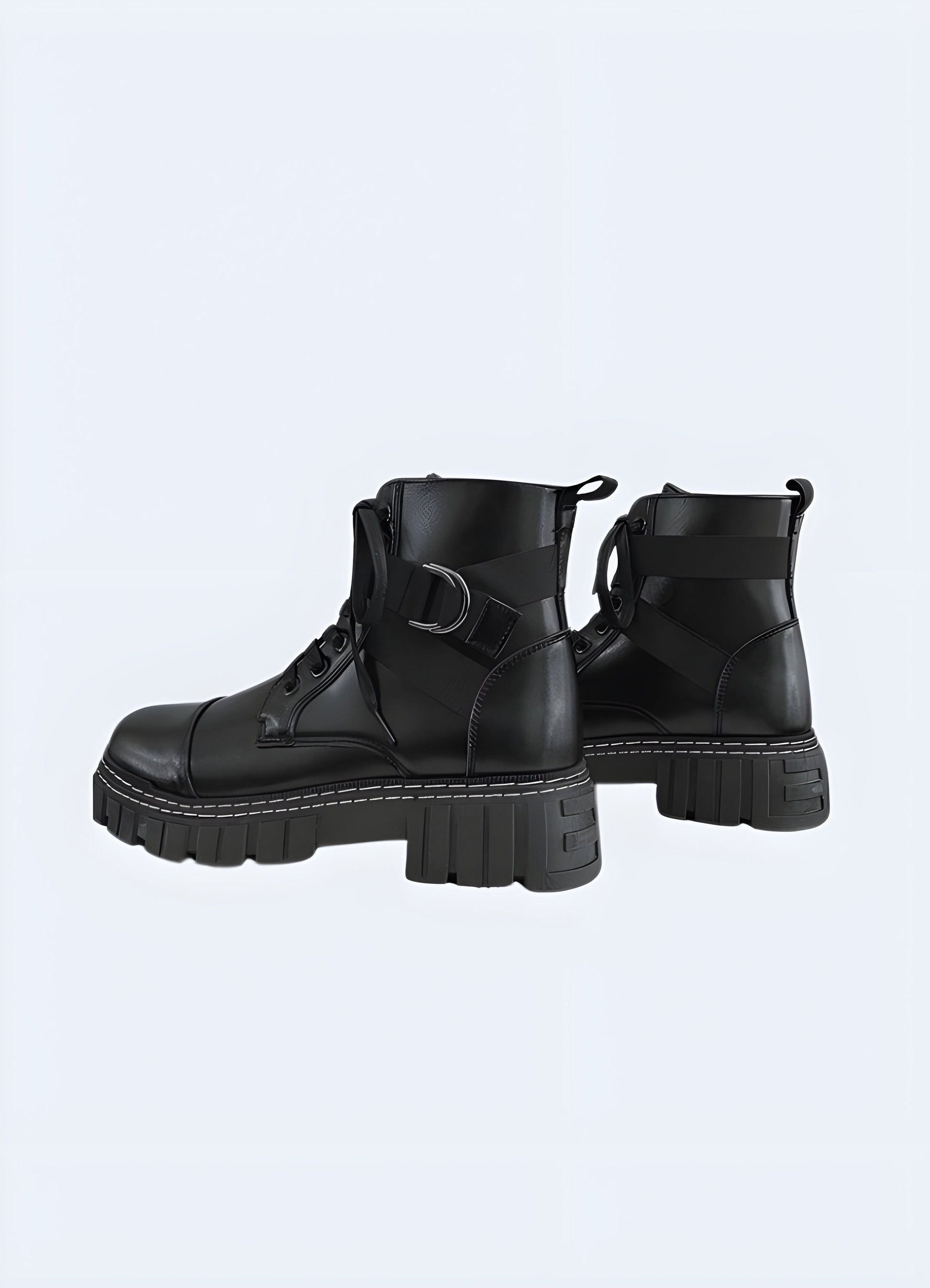 Back and side view of black techwear ankle boots with straps , showcasing the innovative reflective elements, sturdy construction, and futuristic aesthetics for a standout look.