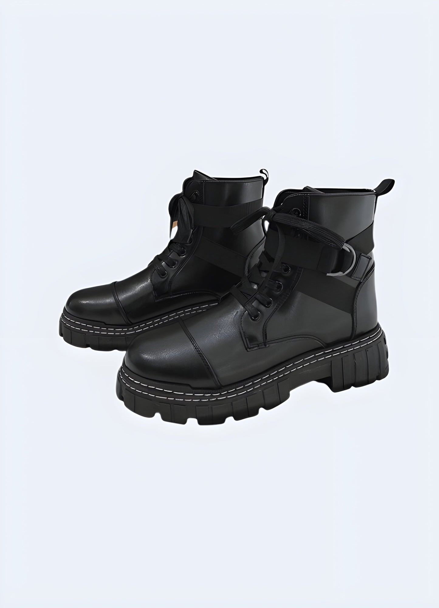 Front side view of black techwear ankle boots with straps  featuring, showcasing their futuristic design and innovative materials, photographed in the Canada.