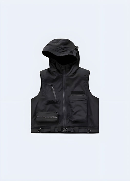 Stylish black techwear vest with hood, designed for urban and tactical use, available in Canada.