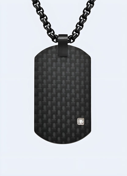 Carbon fiber techwear pendant from the Canada, featuring a sleek and futuristic design ideal for a modern minimalist aesthetic.