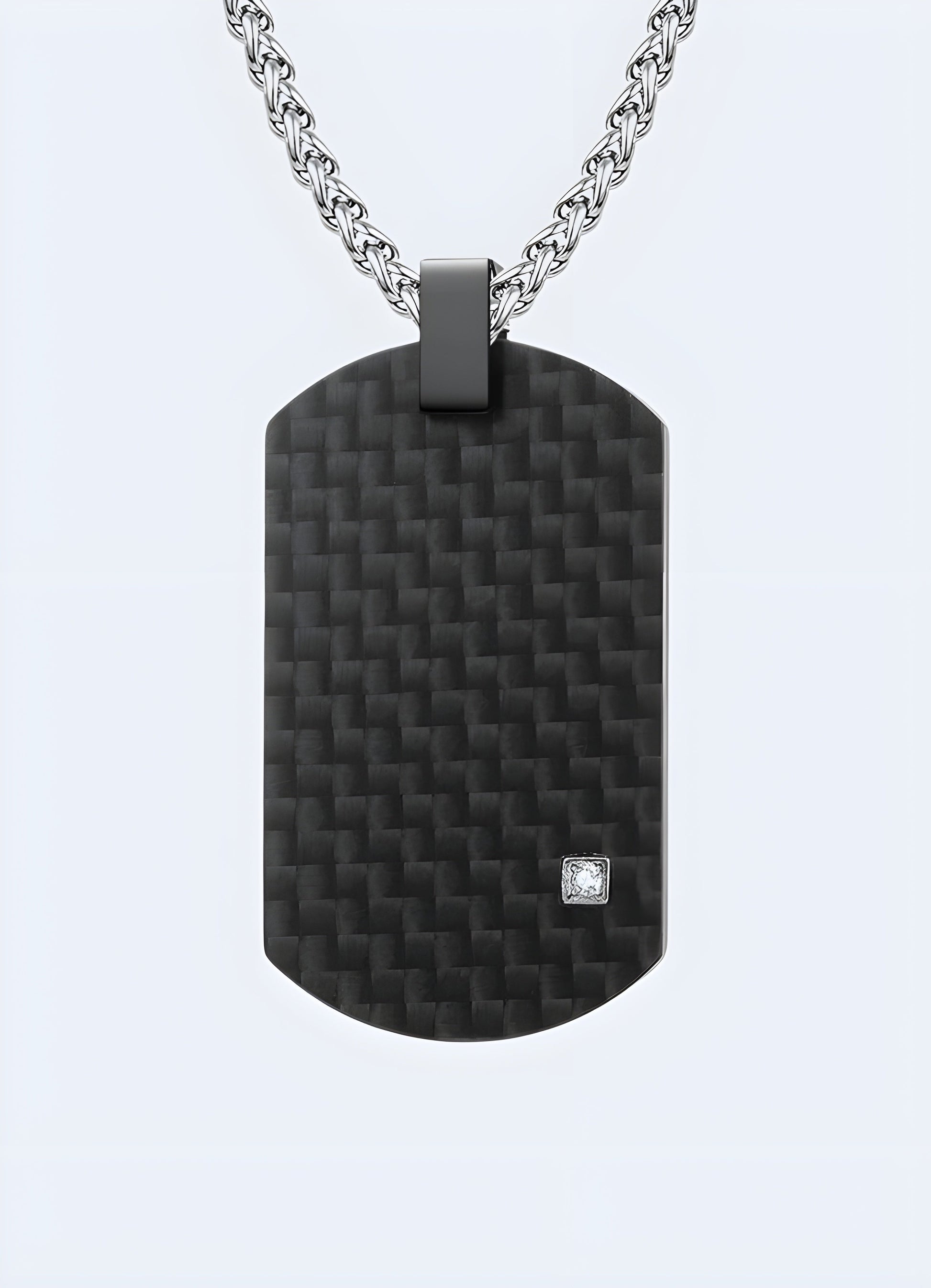 Silver carbon fiber techwear pendant from the Canada featuring a sleek and modern design for a futuristic look.