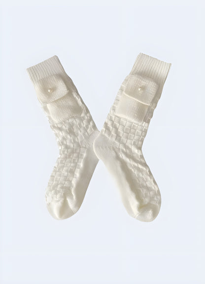 Model showcasing front and side view of cargo socks, featuring practical pockets for everyday carry items, available in the Canada.