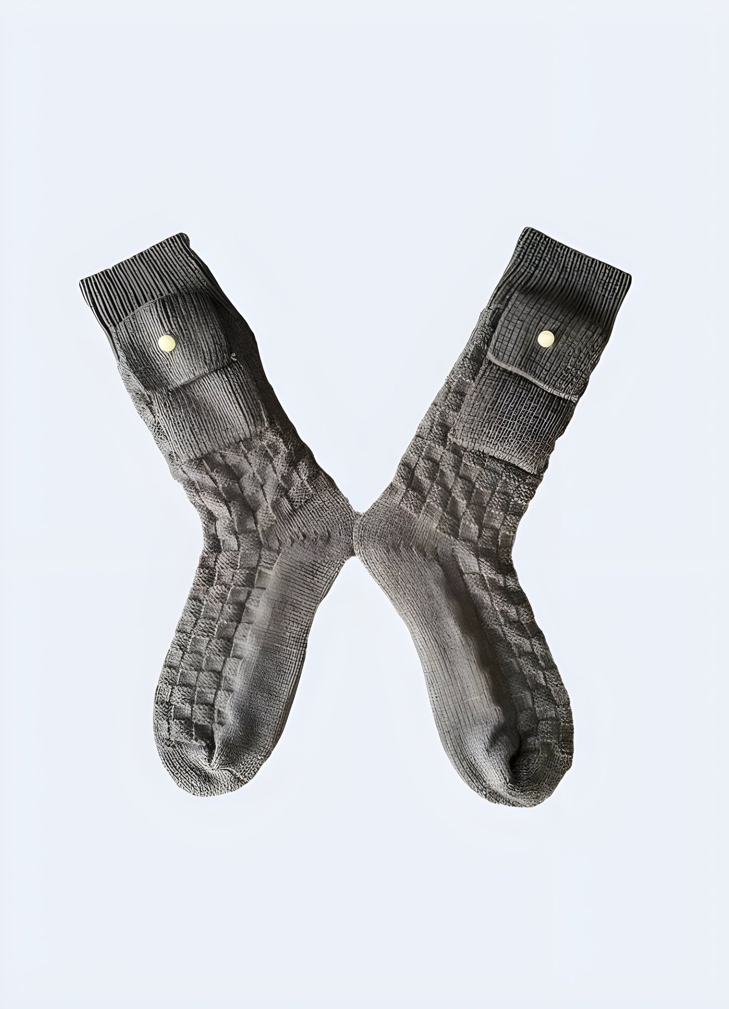 Grey cargo socks with front and side pockets, offering functionality and style for adventurers and commuters in the Canada.