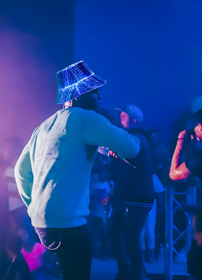 This  illuminated yberpunk bucket hat  side view fuses futuristic style with everyday comfort—an essential accessory for bold streetwear looks.