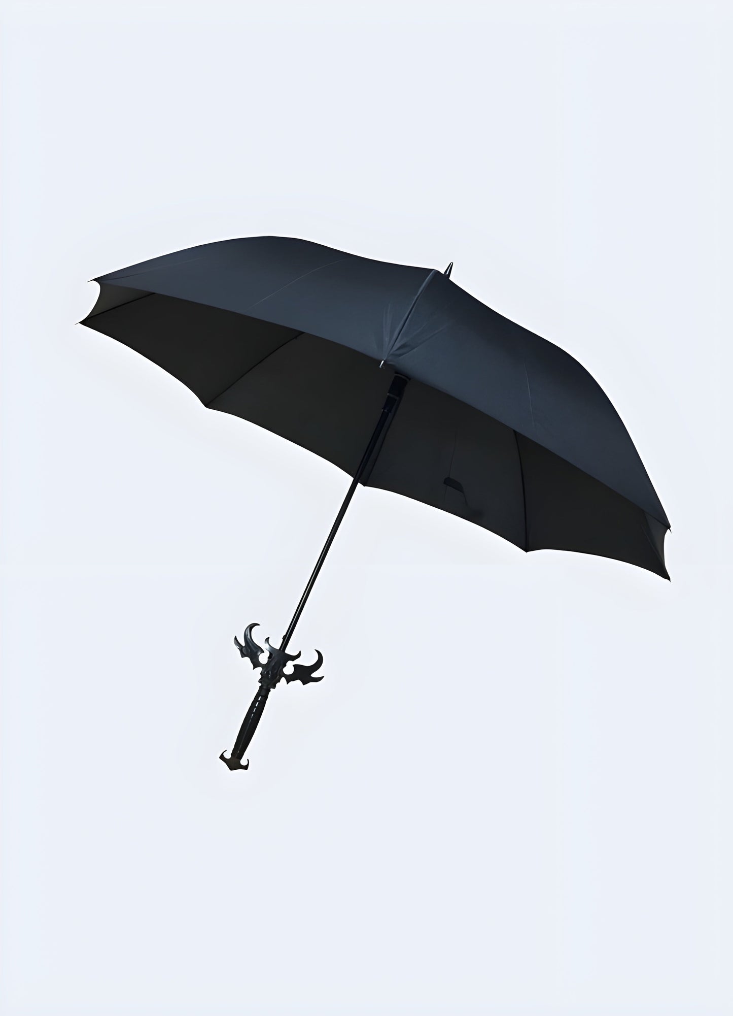 Front view of an open Demon Slayer sword umbrella. The canopy resembles a sword blade, while the handle mimics a sword's hilt Canada.