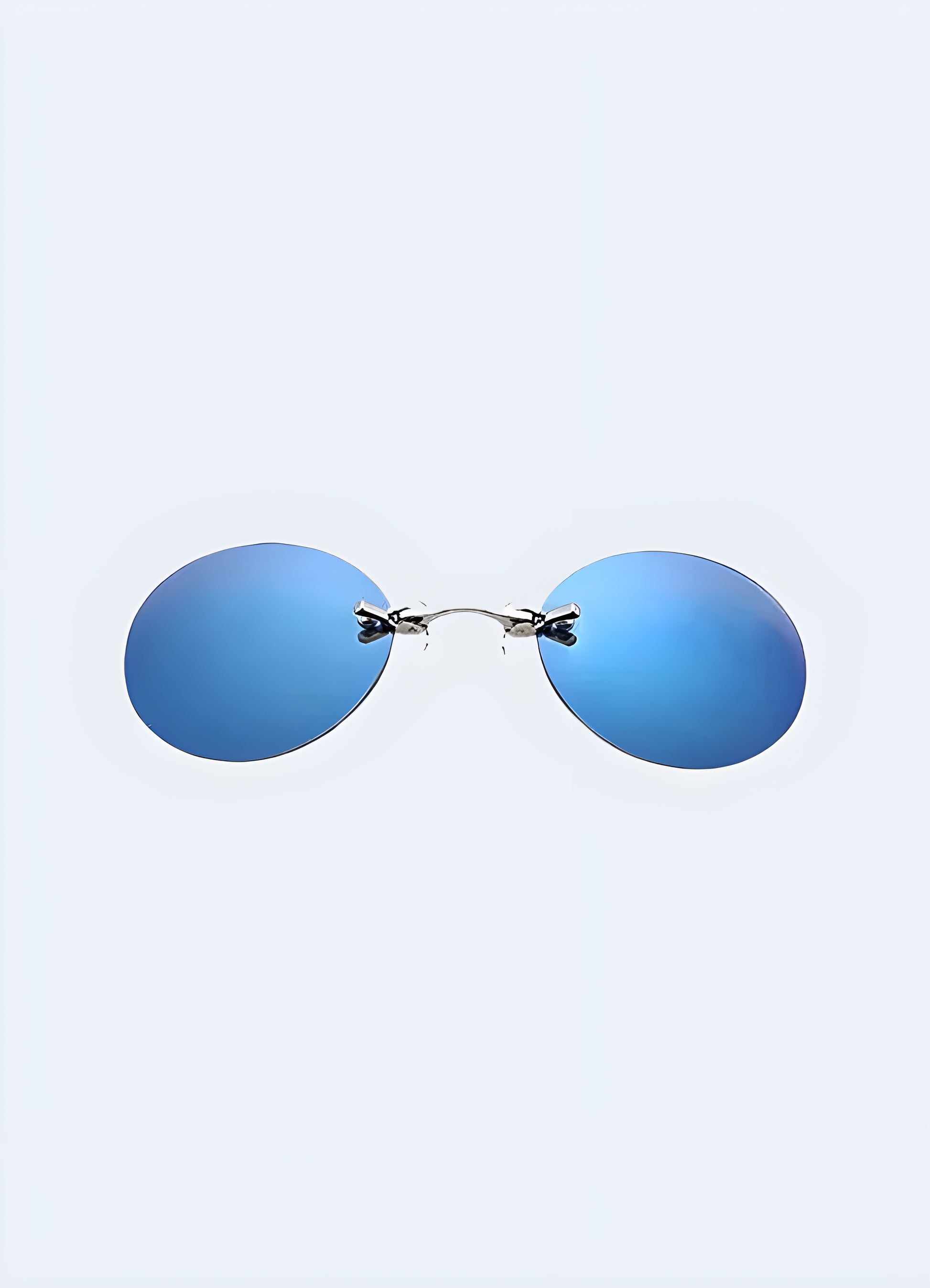 Sleek blue futuristic party glasses viewed from the front, featuring a modern and edgy design perfect for a high-tech, avant-garde look Canada.