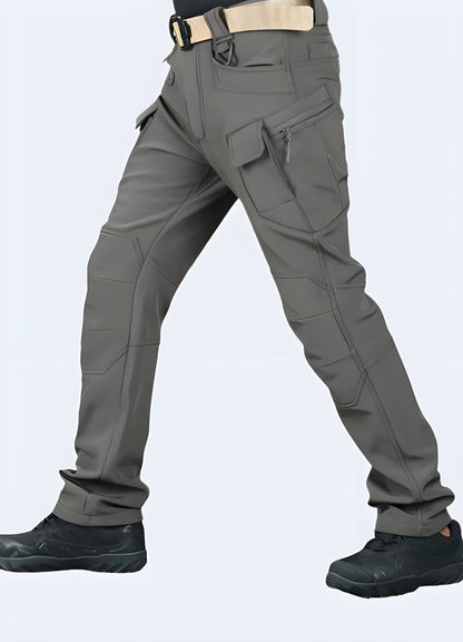 Man wearing grey gorpcore pants, front and side view, demonstrating the perfect blend of fashion and function with a comfortable fit and utilitarian design ideal for the Canadian gorpcore aesthetic.