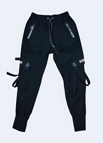 Front view of gothic-inspired cargo pants featuring a black palette and utilitarian design, ideal for elevating dark streetwear styles in Canada.