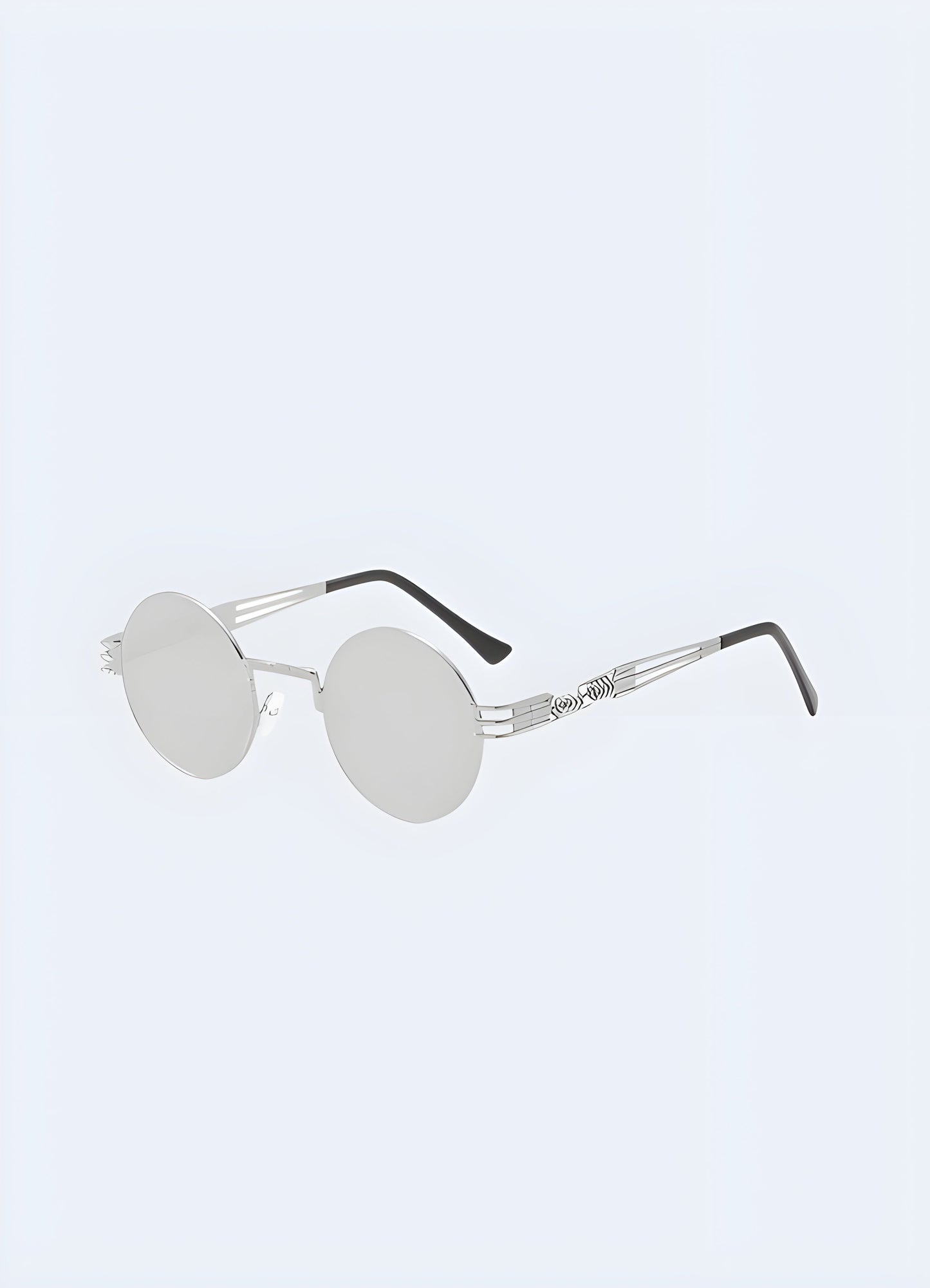 Stylish gothic sunglasses with a sleek silver frame, designed for a bold and edgy look, shown in a front side view perspective, available in the Canada.