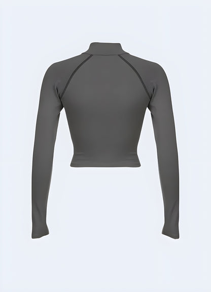 Back view of a grey techwear long sleeve shirt, showcasing its ergonomic fit and high-quality construction for comfort and durability in the Canada urban landscape.