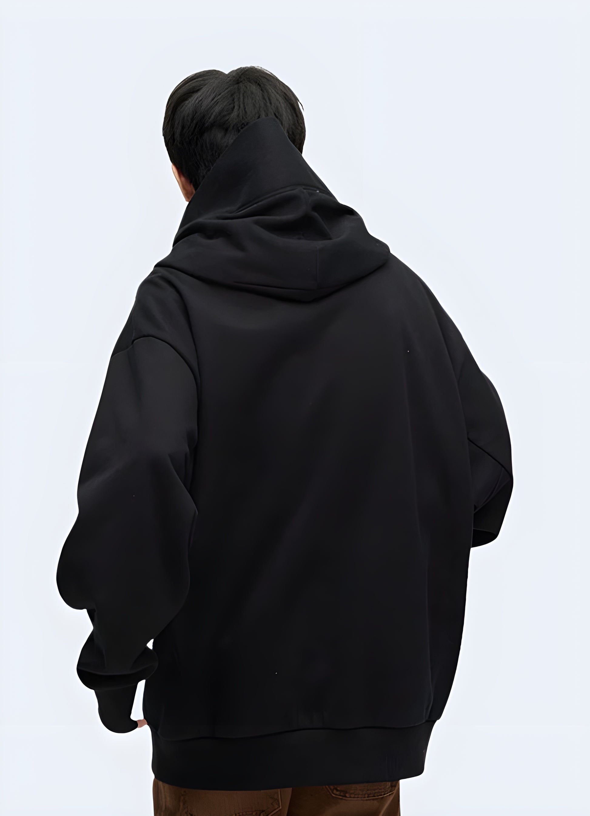 The back shows the unique design and oversized fit, contributing to a trendy and artistic appearance.