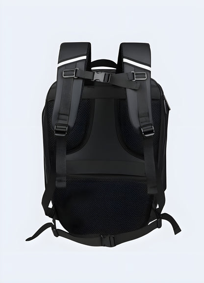 Hardshell anti-theft cyberpunk backpack in carbon finish with integrated LED lights, back view – futuristic urban techwear design.