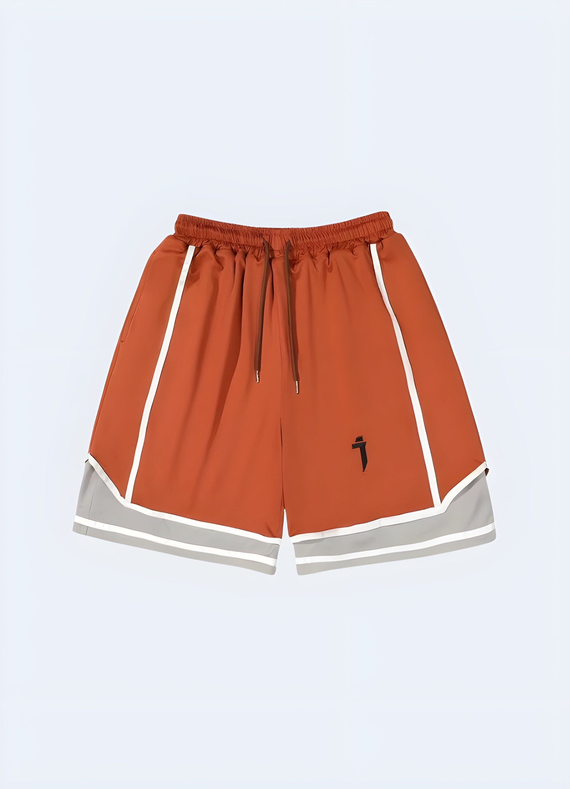 Eye-catching orange hip-hop techwear shorts, front view, designed for fashion-forward men in the.