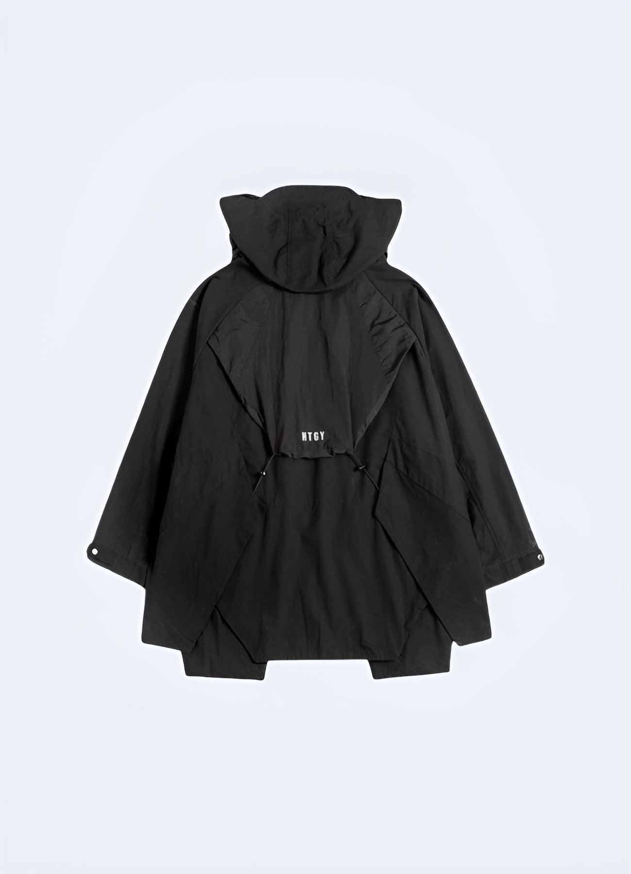 Back view of a stylish Japanese anorak showcasing its adjustable hood, streamlined fit, and durable construction, ideal for exploring Canada's urban and natural landscapes while maintaining a modern, minimalist aesthetic.