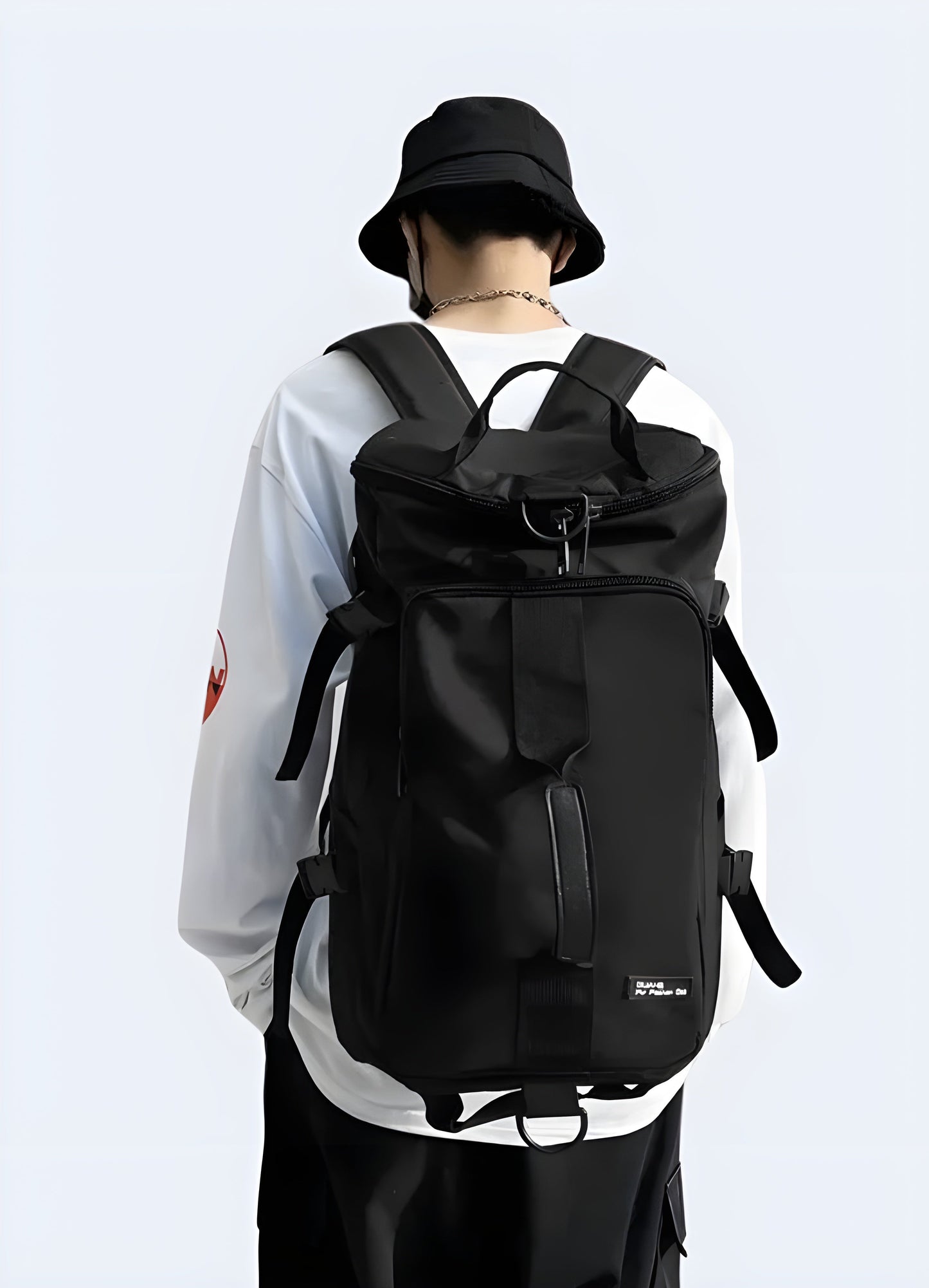 Back view of a black Japanese streetwear backpack featuring durable construction and ergonomic straps Canada.