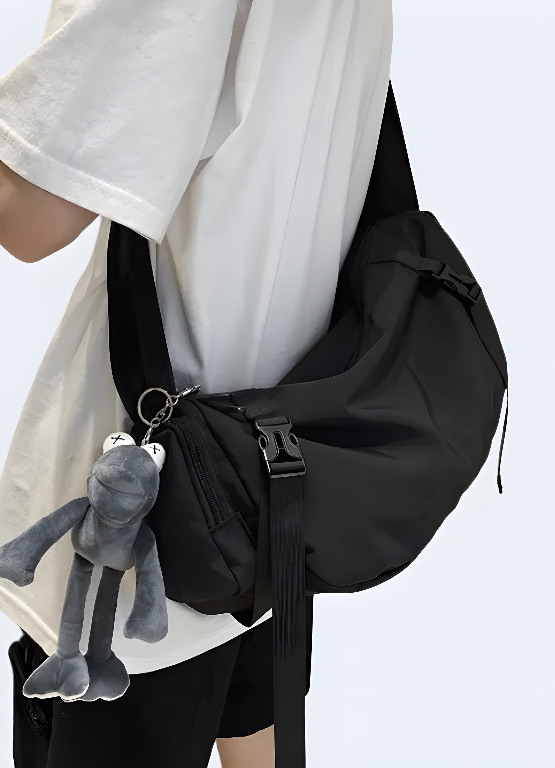  Side view of a black Japanese streetwear backpack highlighting its sleek profile and practical design elements Canada.