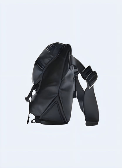 Side view of a Japanese techwear crossbody bag from the Canada, showcasing its sleek lines and functional compartments.