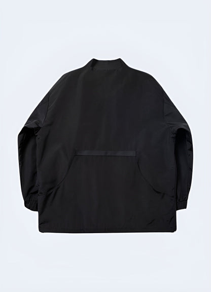 Back view of a black Japanese work coat showcasing its distinctive design elements, durable construction, and modern silhouette, ideal for expressing a one-of-a-kind fashion sense while staying comfortable in Canada's dynamic city environments.