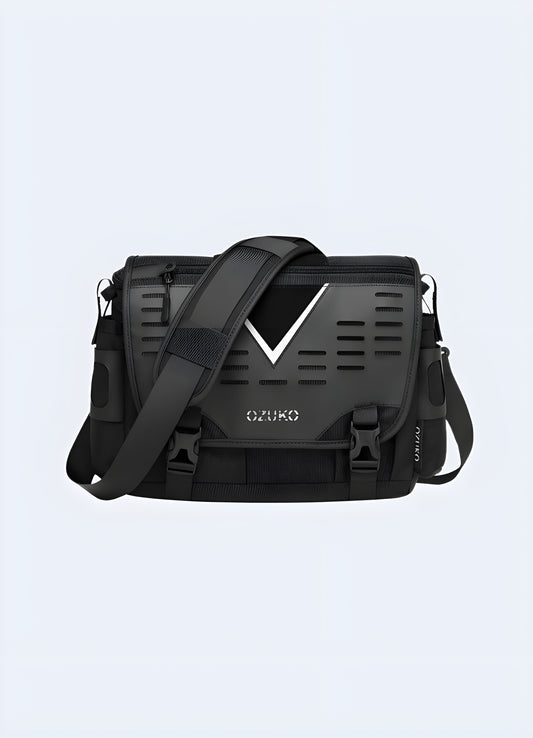 The bag features a spacious main compartment, a flap cover with a buckle closure, and an adjustable shoulder strap. It is shown in a neutral color, such as black or brown, with subtle branding or design details Canada.