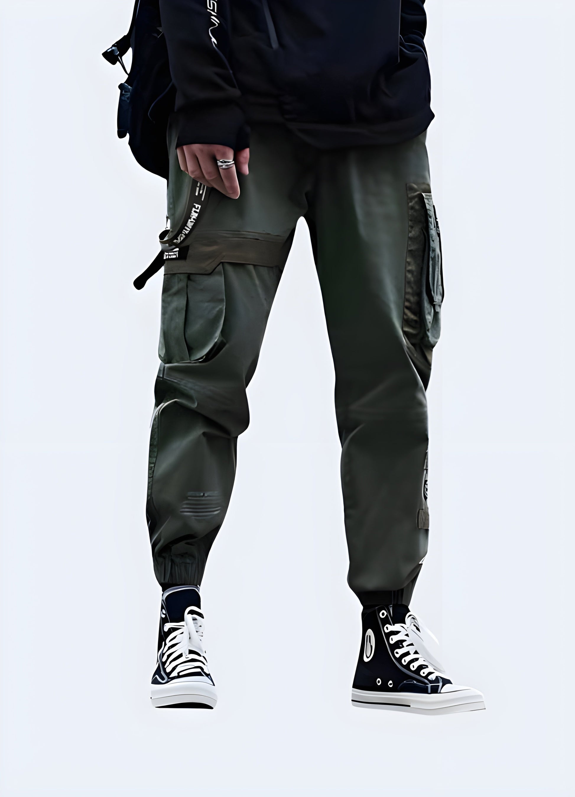 Fashionable army green baggy techwear pants worn by a man, ideal for streetwear and outdoor activities in Canada.