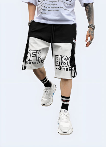 Front view of a man wearing black and white cargo shorts, showcasing the monochromatic design and modern features, perfect for the fashion-conscious individual Canada.