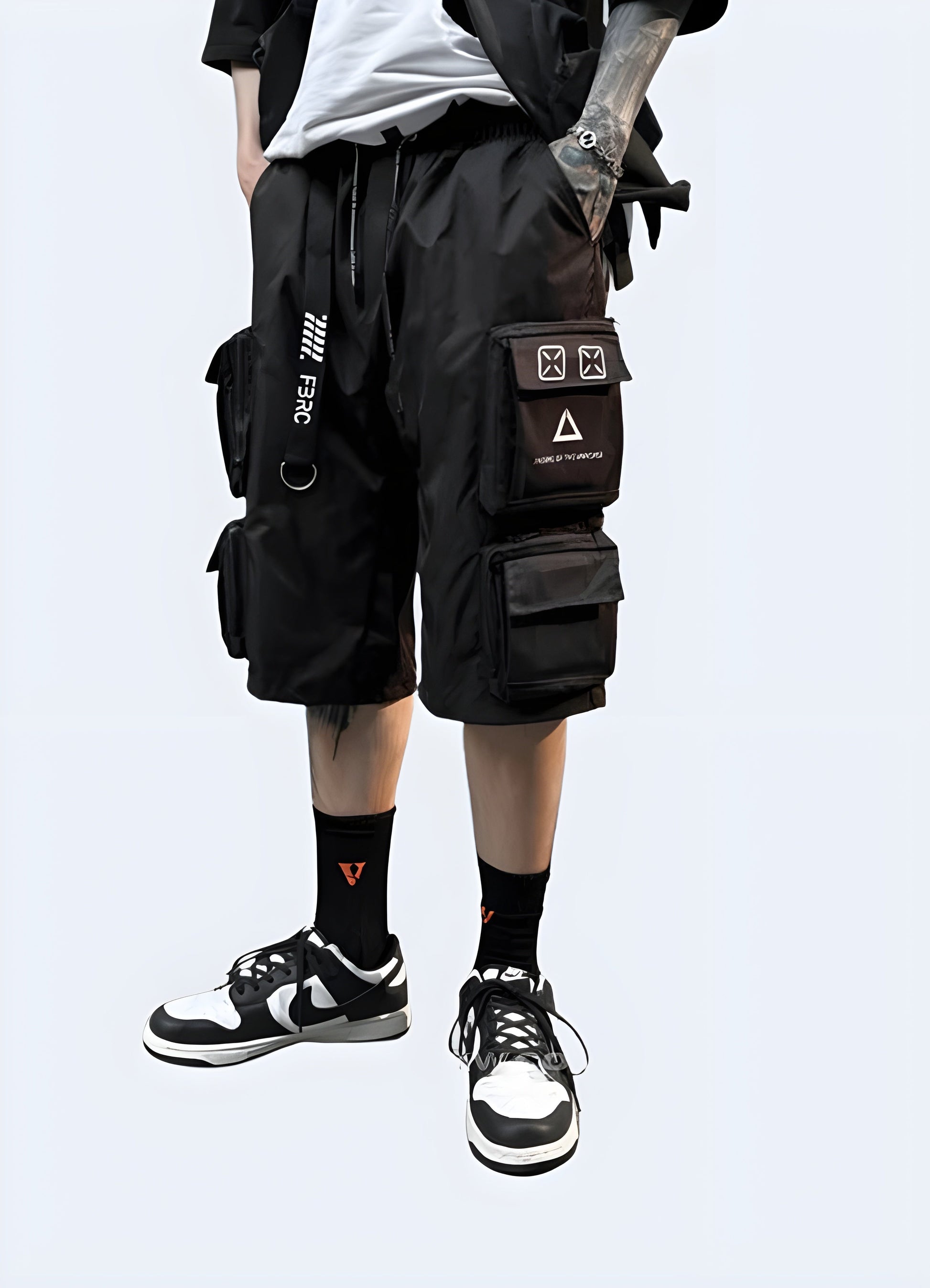 Front side view of men wearing black harajuku tactical shorts, showcasing the intricate ribbon details and high-quality construction, ideal for the fashion-forward individual Canada.