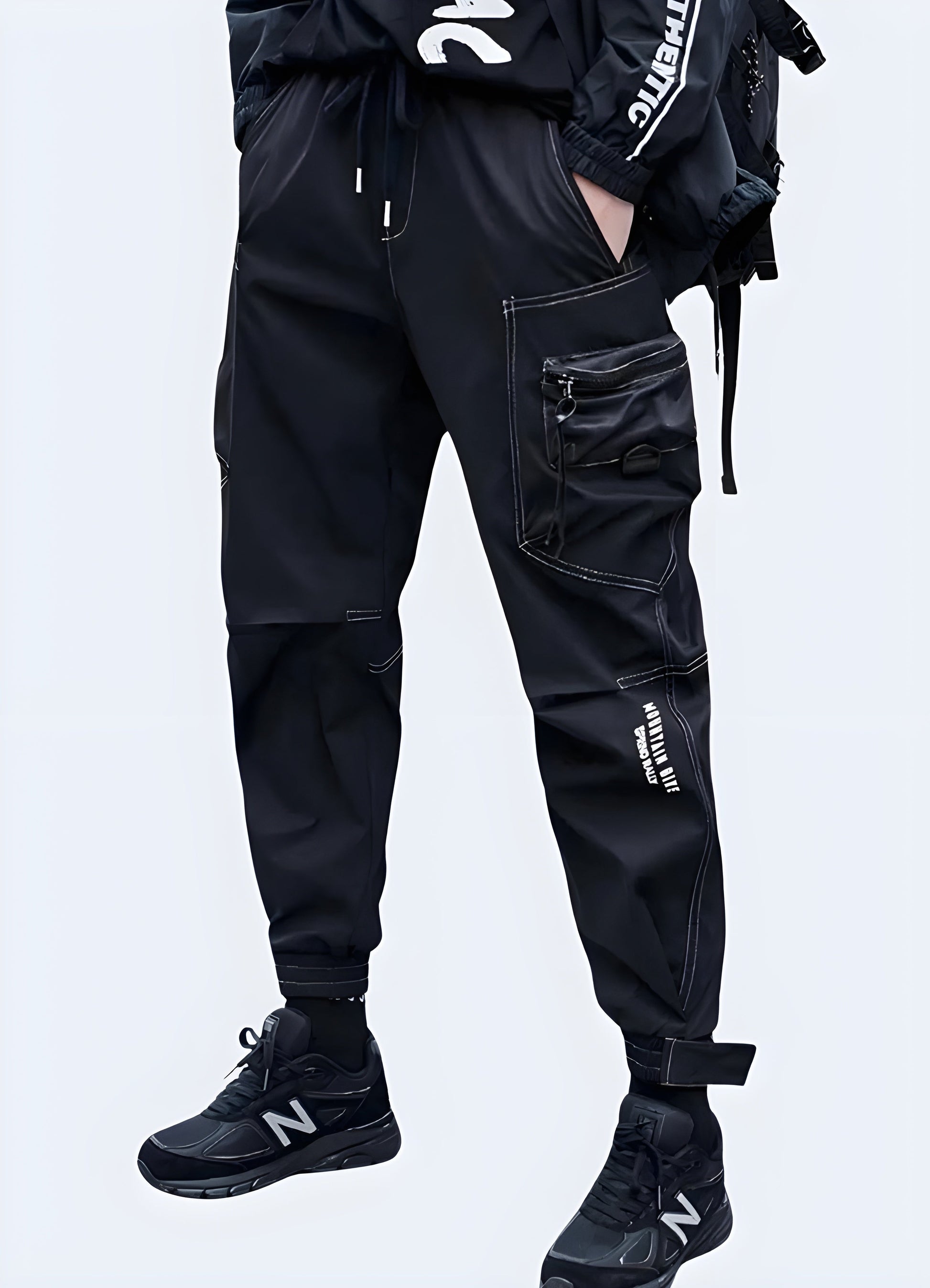 Front-side view of a man wearing fashionable black skinny cargo pants in Canada, highlighting their modern silhouette and practical utility pockets suitable for urban adventures.