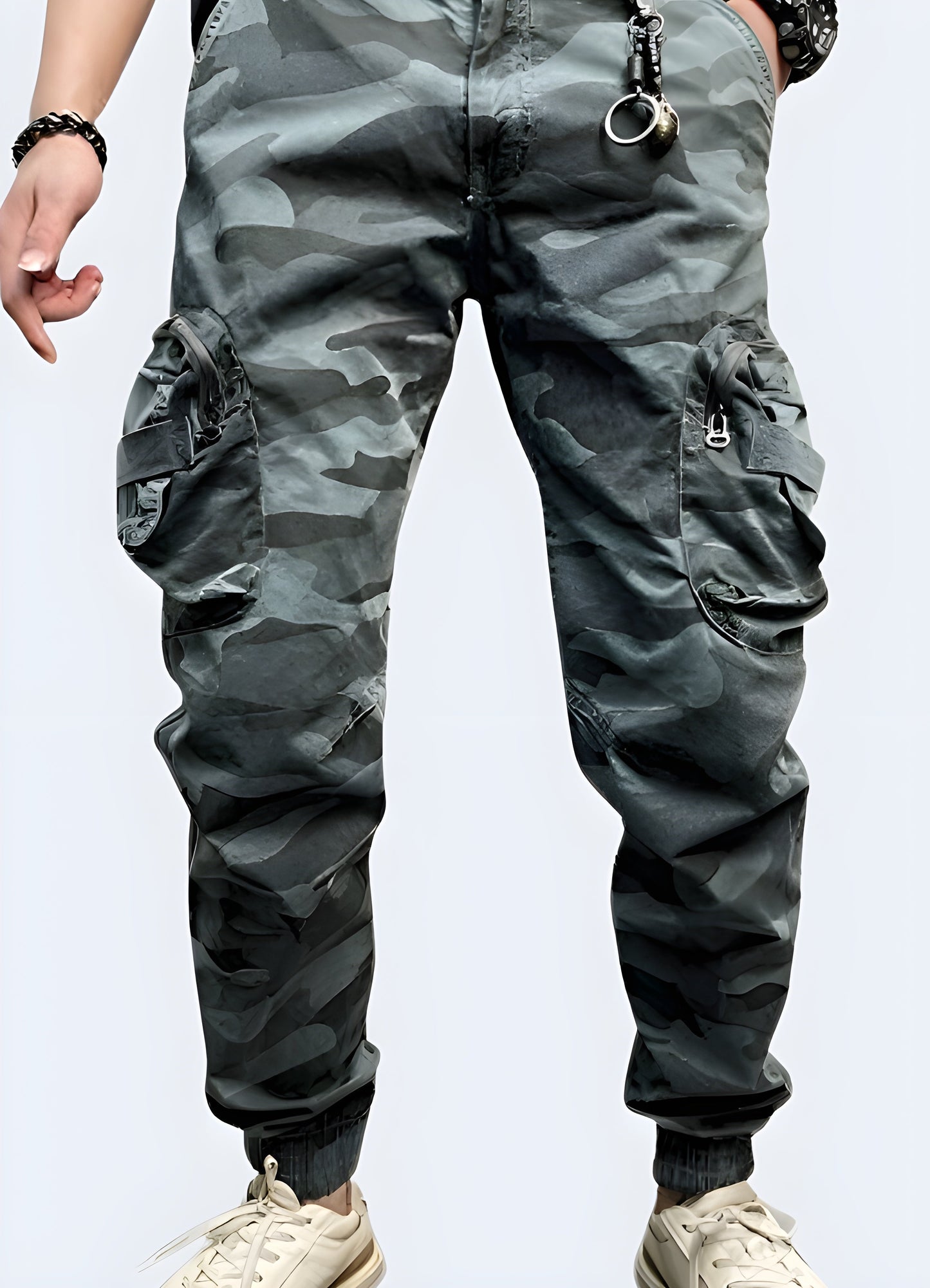 Front view of a man wearing baggy camo cargo pants, showcasing the loose silhouette, iconic camouflage pattern, and utility-focused design ideal for urban fashion in Canada.