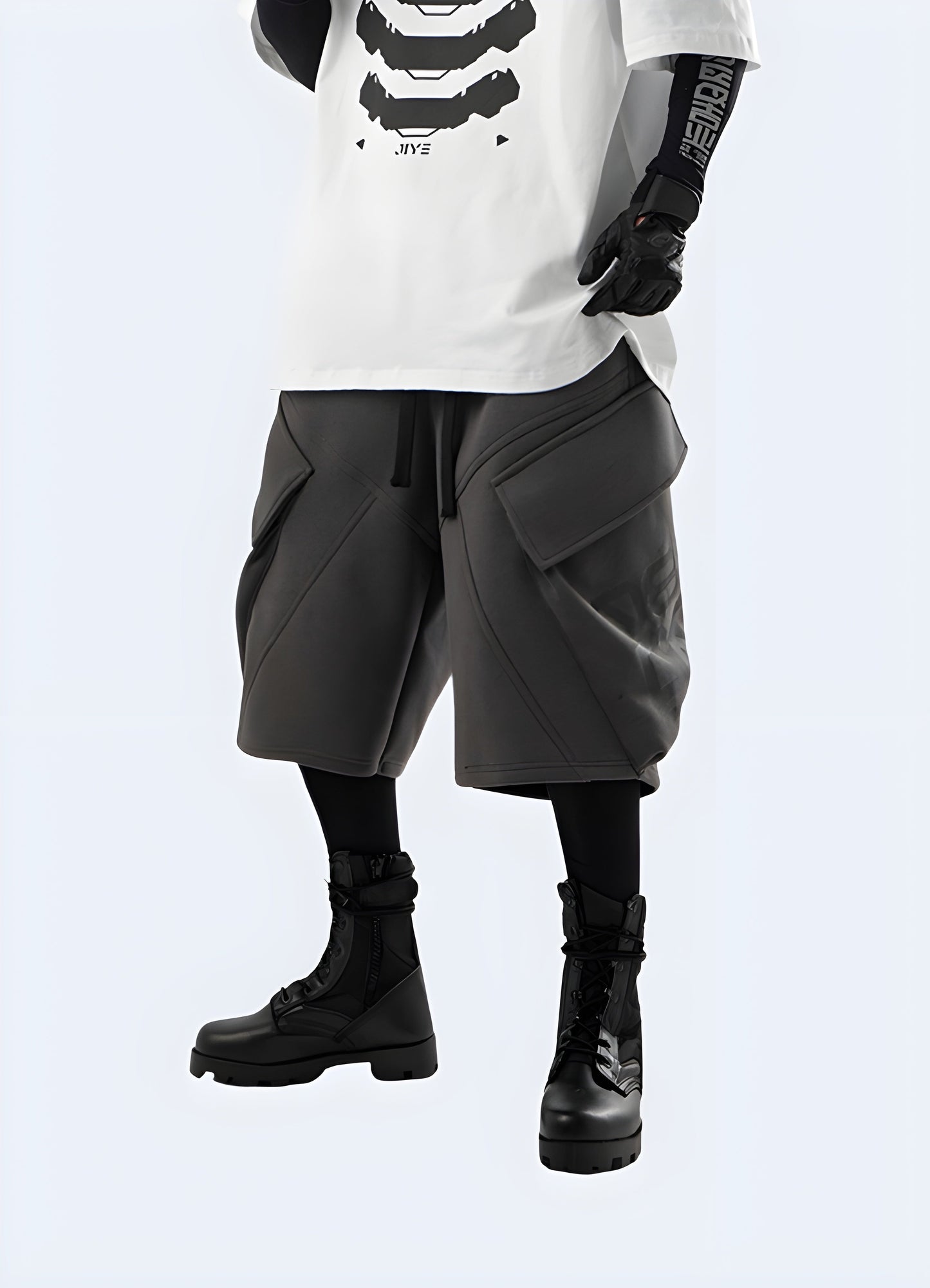 Man wearing grey cyberpunk cargo shorts, showcasing the striking color and avant-garde style, ideal for standing out in the alternative fashion scene.