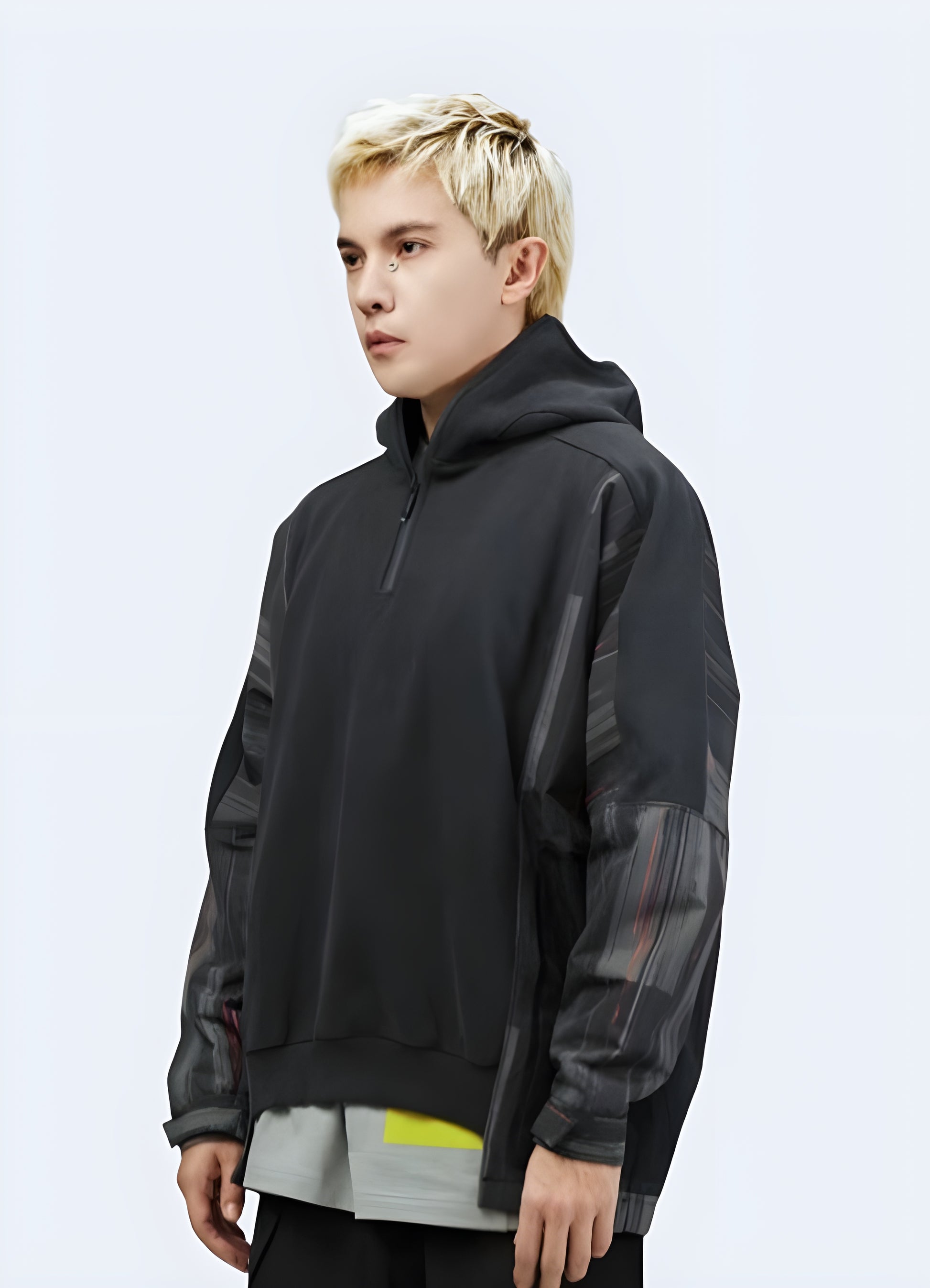 Man wearing cyberpunk ninja patchwork hoodie front view available in Canada, highlighting its edgy look and modern appeal.