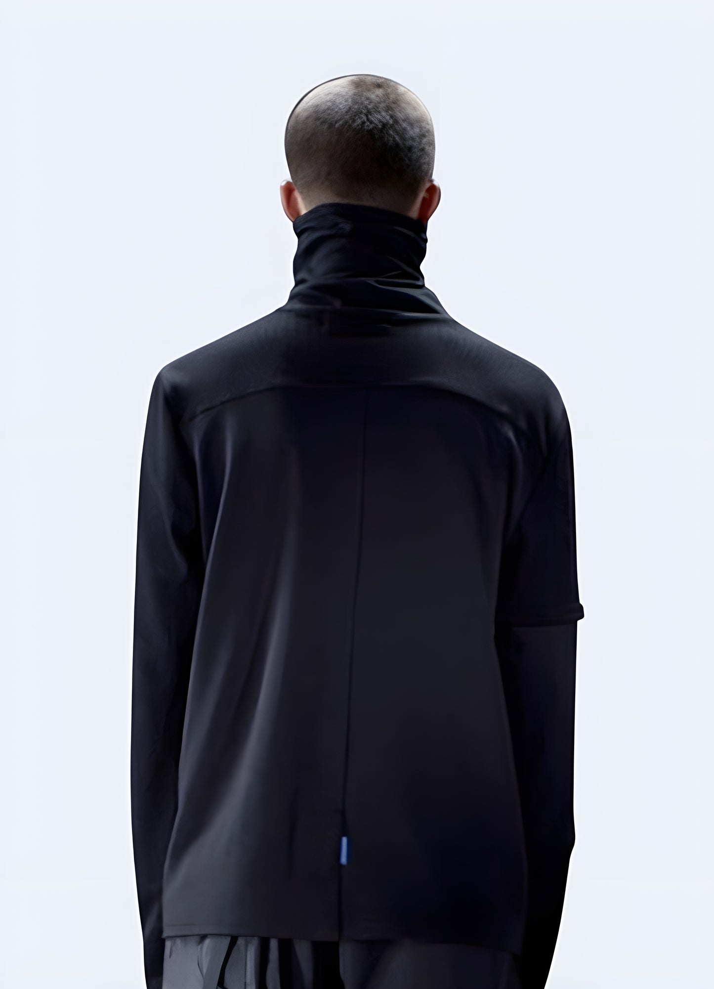 Man wearing cyberpunk turtleneck, back view, available in Canada, showcasing its unique style and intricate details.