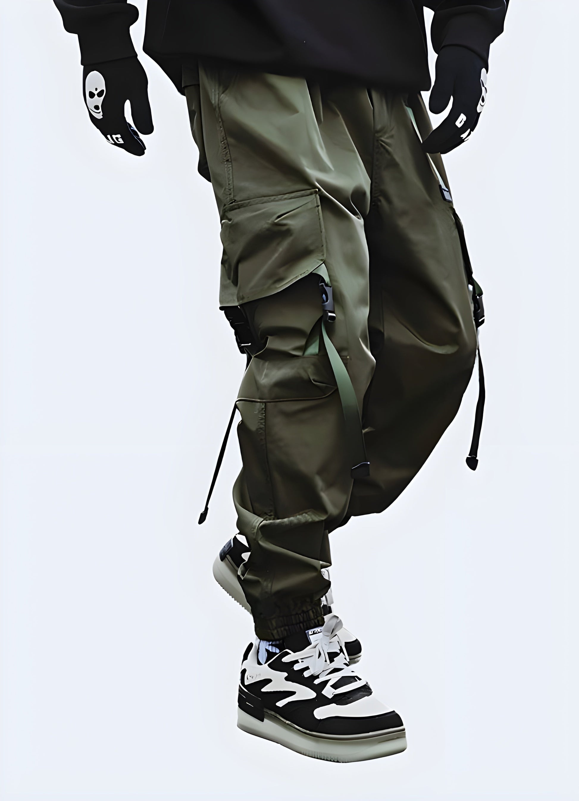 Front view of a man wearing trendy dark green cargo pants, showcasing the garment's rugged aesthetics and practical features, perfect for fashion-forward individuals in the canada.