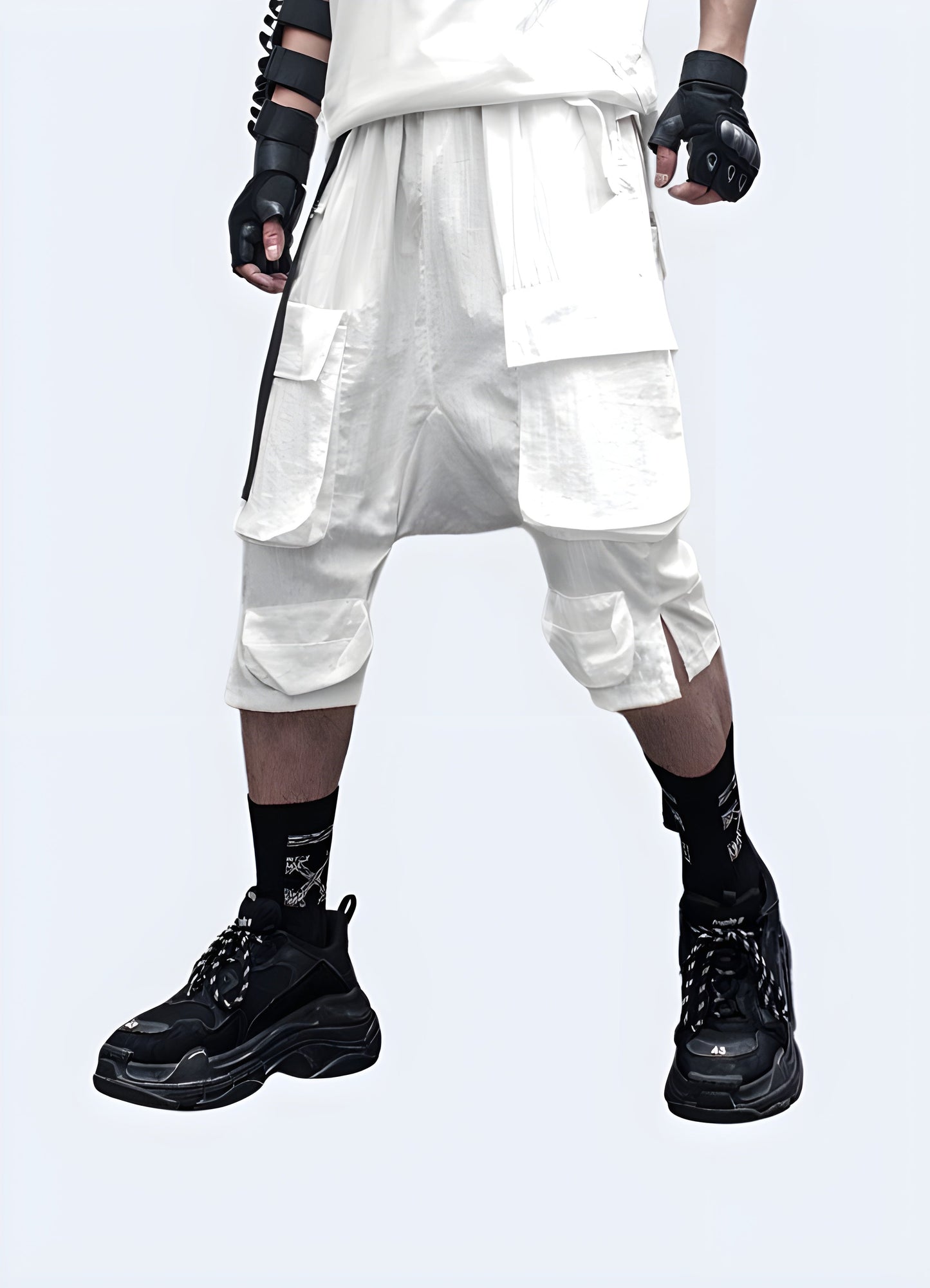 Front view of a model donning avant-garde drop crotch techwear shorts, emphasizing the garment's edgy aesthetic, advanced technical features, and perfect blend of fashion and functionality for the modern urban adventurer Canada.