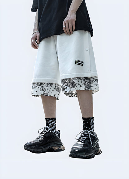 Front view of a man wearing black and white bandana shorts, highlighting the bold contrast and fashionable design, perfect for the urban fashion scene.