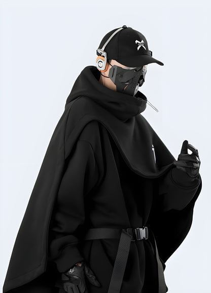 Man wearing functional fake two-piece unisex cape hoodie side view available in Canada, highlighting its modern fit and innovative style.