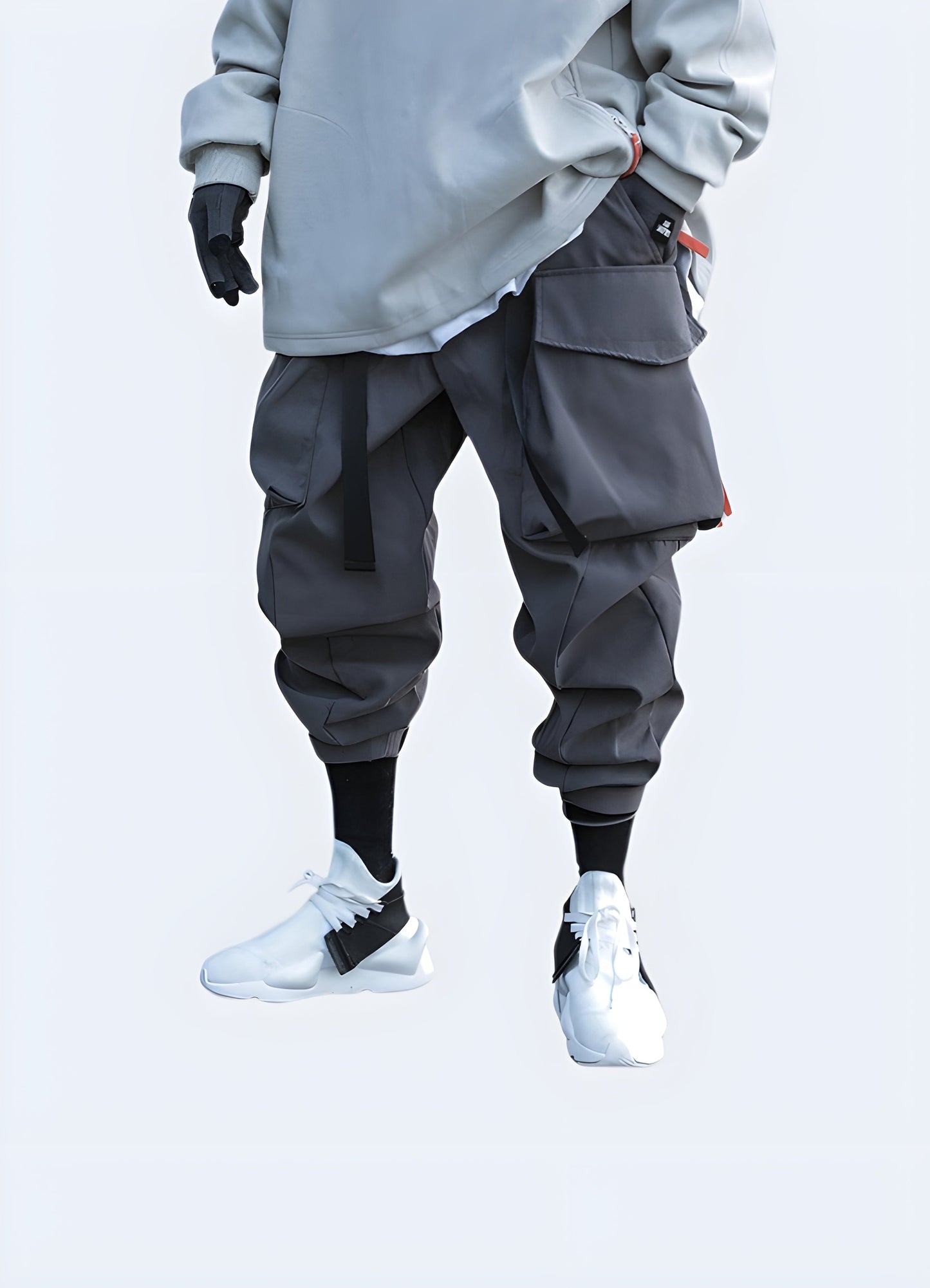 Man wearing comfortable grey tactical pants, front view, showcasing the practical design and rugged construction suitable for various Canadian environments.