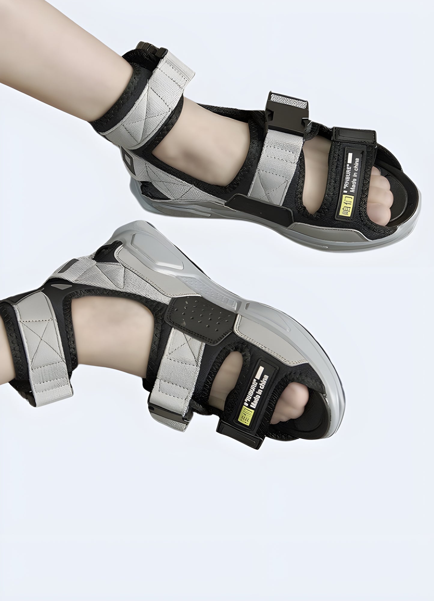 Man wearing grey techwear sandals, front side view, available in Canada, highlighting their unique design and versatile appeal.