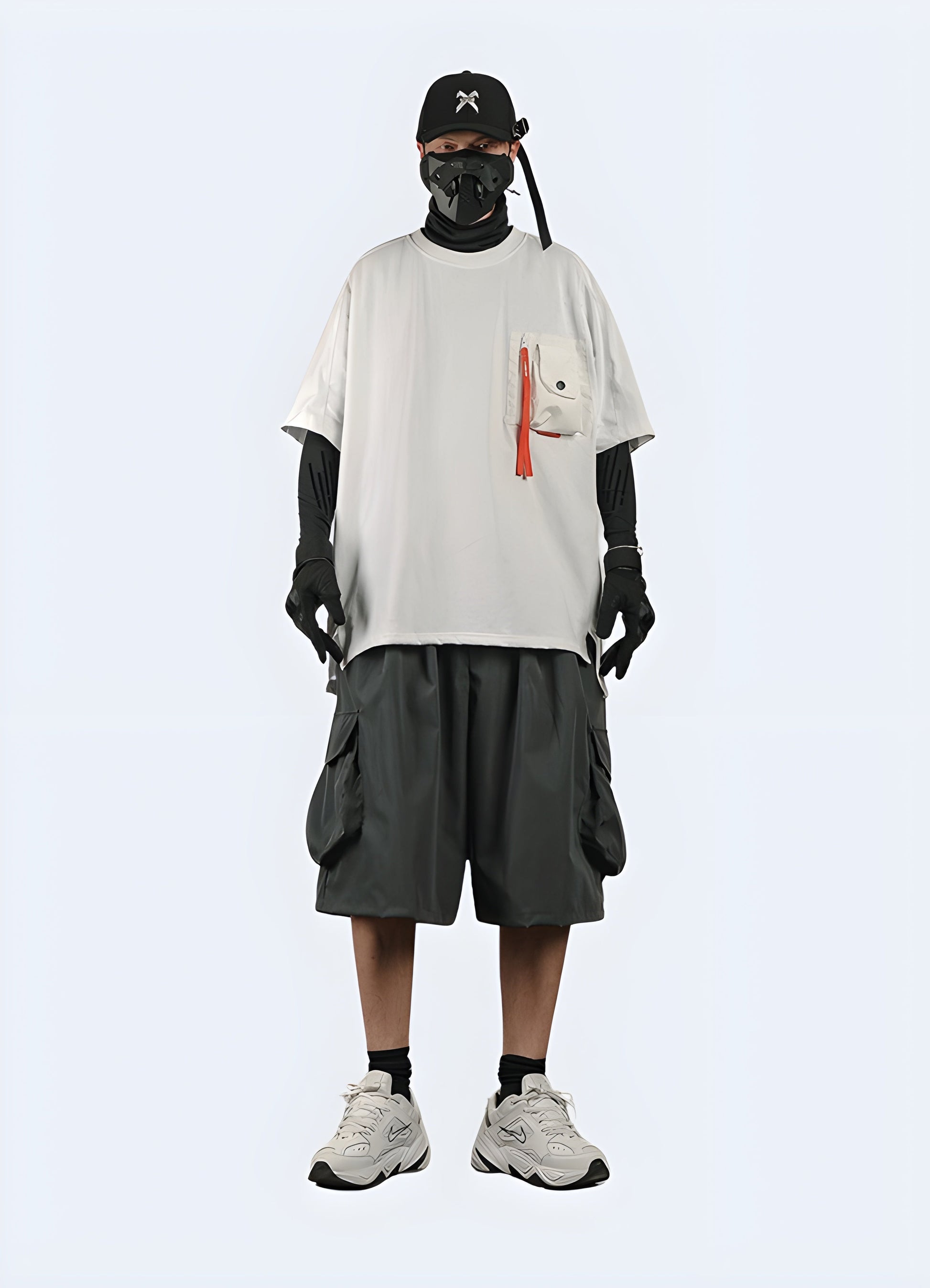 Men wearing grey techwear shorts samurai skirt attached from the front view, showcasing the eye-catching design and comfortable fit, perfect for embracing the samurai-inspired fashion trend in the Canada.