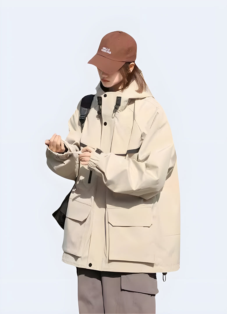 Men wearing hooded cargo jacket beige side view.