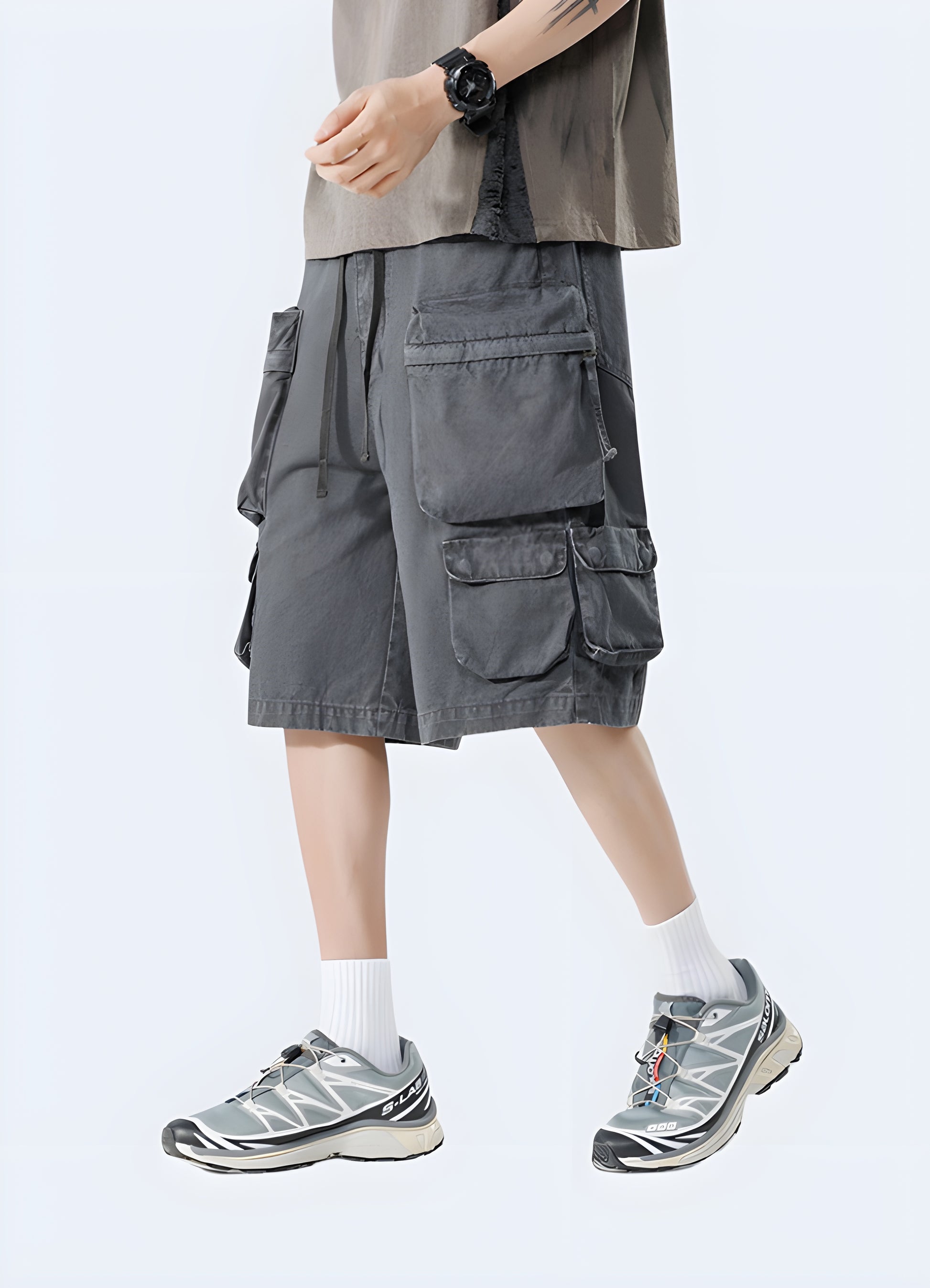 Front view of a man wearing industrial cargo shorts, showcasing the heavy-duty construction and practical features, perfect for the laborer Canada.