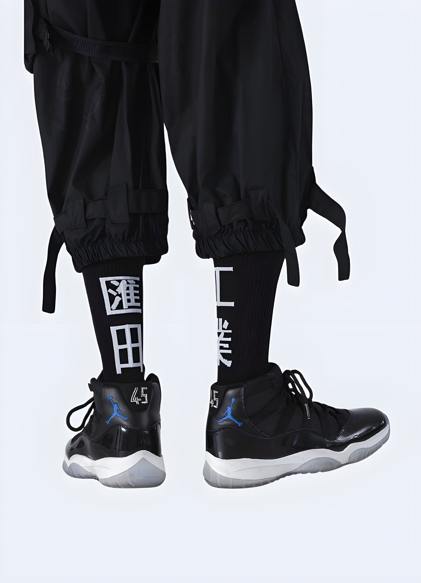 Back view of a man wearing black kanji socks, highlighting the eye-catching design and comfortable fit for Canada streetwear enthusiasts.