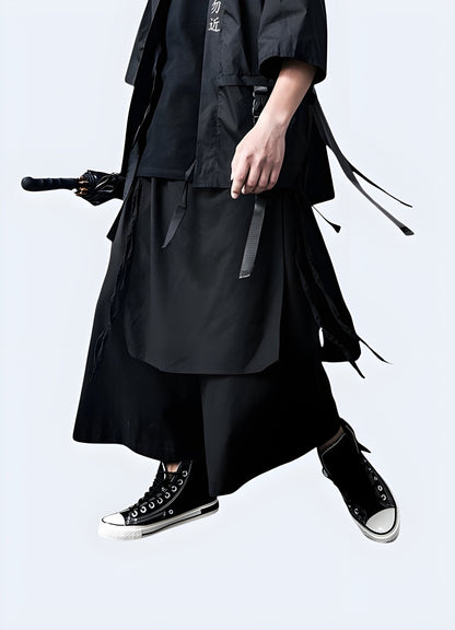 Side view of a man modeling genuine Bushido pants, showcasing the garment's exceptional fit and attention to detail, perfect for martial arts training or streetwear fashion in the Canada.