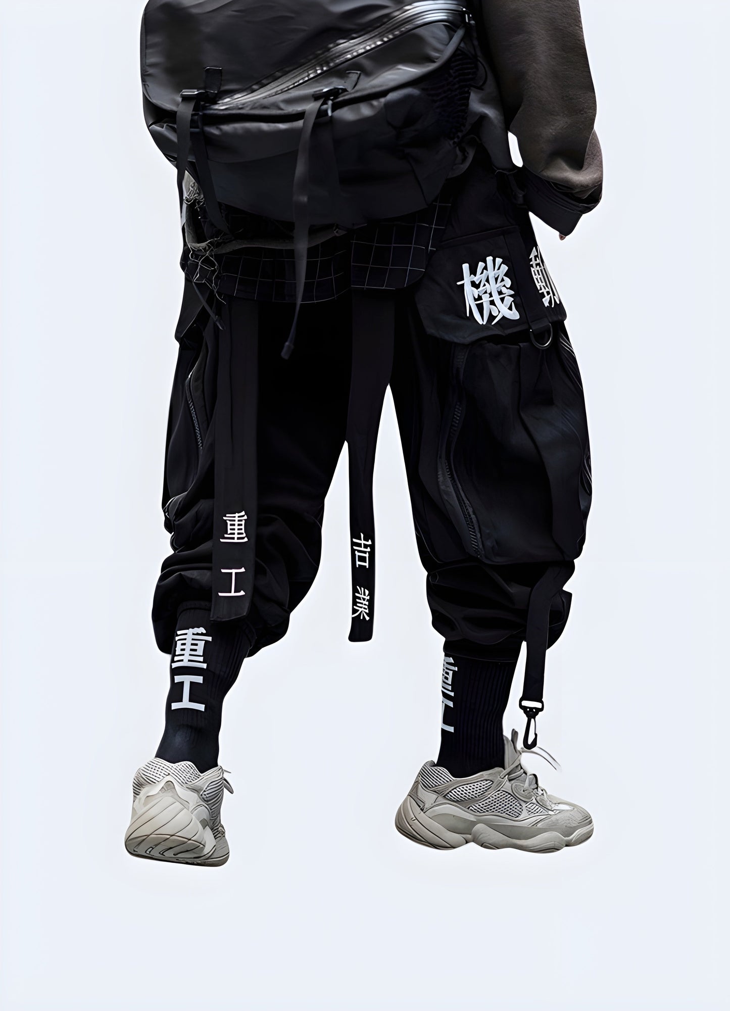  Back view of a man modeling genuine shinobi pants, showcasing the garment's unique style and attention to detail, perfect for ninja-inspired fashion or martial arts training in the Canada.