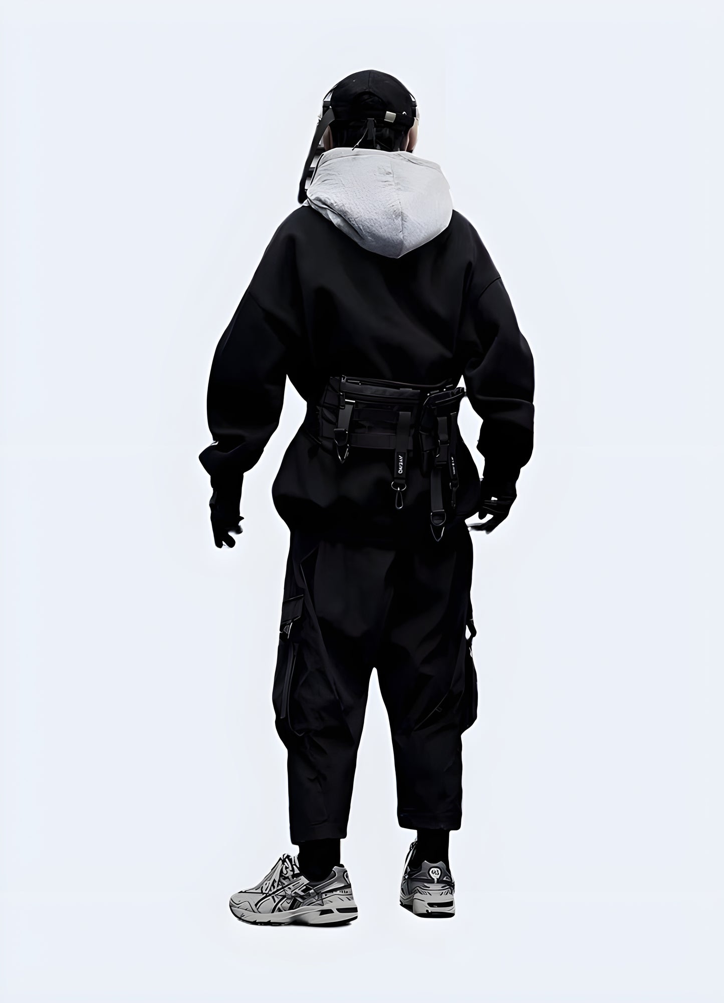 Man wearing black techwear ninja pants, back view, Canada urban style clothing.