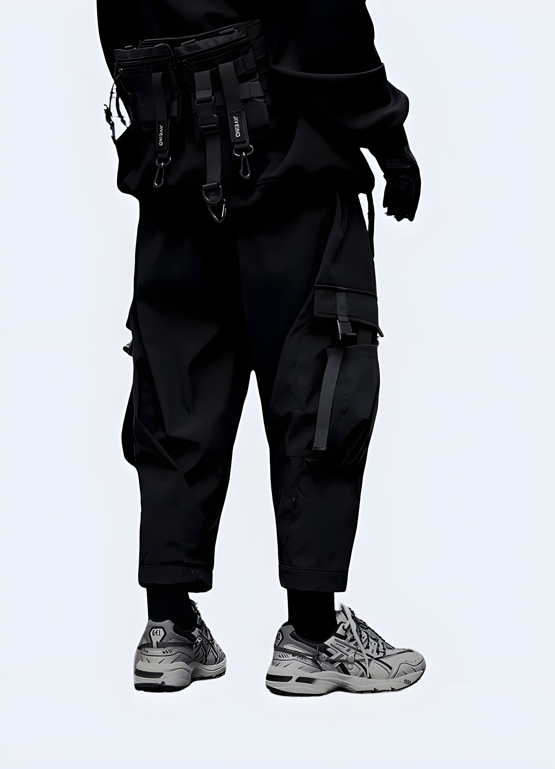 Man wearing black techwear ninja pants, back view, Canada urban style clothing.