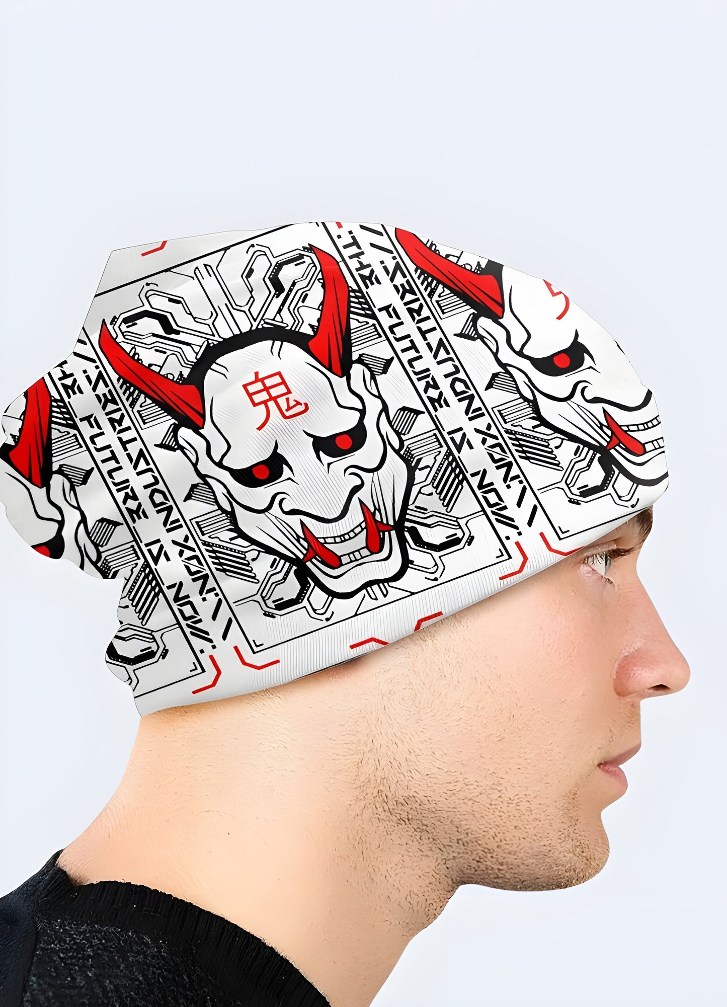 A man is wearing a white Oni Demon beanie, viewed from the side. 