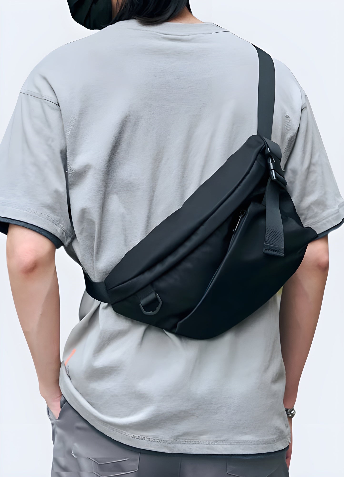 Front view of a man with a streetwear crossbody bag, showcasing its urban style and practicality Canada.