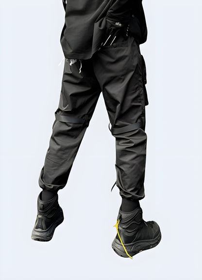  Back side view of a man modeling stylish streetwear joggers, highlighting the premium materials and attention to detail, a must-have for Canada streetwear enthusiasts seeking both comfort and style.