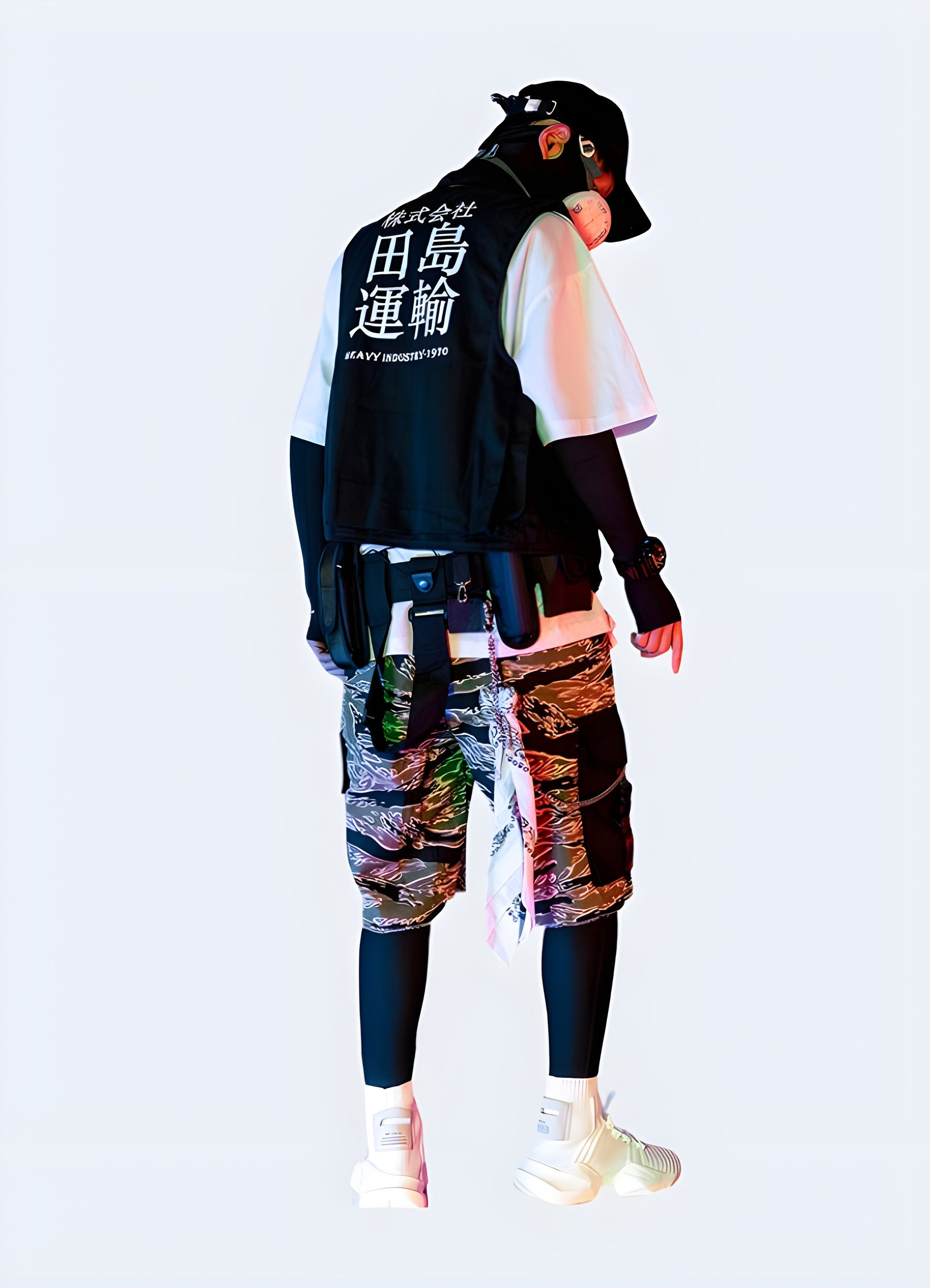 Back view of a man wearing techwear camo shorts, highlighting the unique camouflage pattern and technical features, perfect for the Canada urban explorer.